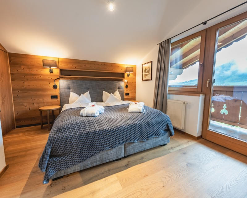 JuniorSuite A SUP mit Doppelbett und Zugang zum Balkon